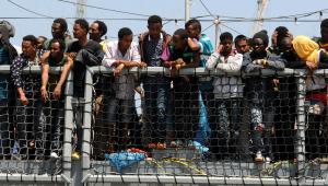 Migrants wait to disembark from the German Navy ship&nbsp;&hellip;