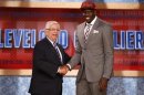 Bennett from the UNLV shakes hands with NBA Commissioner Stern after being selected by the Cavaliers as the first overall pick in the 2013 NBA Draft in Brooklyn