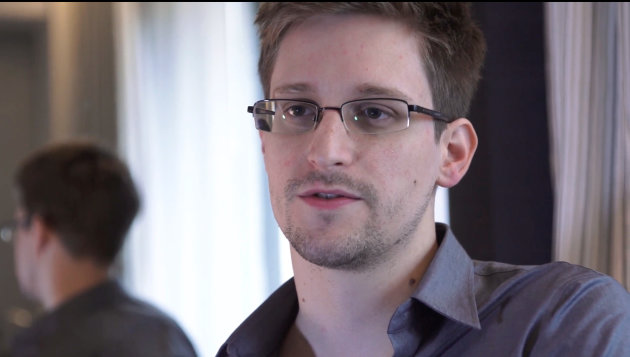 This June 9, 2013 photo provided by The Guardian Newspaper in London shows Edward Snowden in Hong Kong. The National Security Agency is telling Congress that an agency employee resigned after admitting to investigators that he gave Snowden a digital key that allowed him access to classified materials. Snowden has said he did not steal any passwords. (AP Photo/The Guardian, Glenn Greenwald and Laura Poitras)
