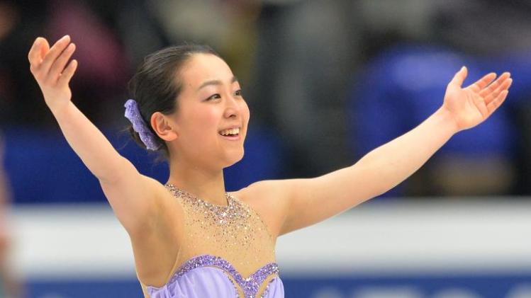 Japan&#39;s Mao Asada gestures after her performance at the world figure skating championships in Saitama on March 27, 2014