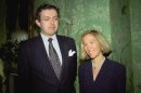 FILE - This Nov. 26, 1996 file photo shows Eva Rausing, right, and her husband Hans Kristian Rausing at Winfield House, London, the residence of the US ambassador to the UK attending the Glamour America Fashion Show and lunch. Hans Kristian Rausing has pleaded guilty at London's Isleworth Crown Court Wednesday Aug. 1, 2012, to preventing the proper burial of his wealthy wife Eva, whose decomposing body lay in their luxury home for two months before it was discovered. (AP Photo/Alan Davidson/The Picture Library Ltd, File)