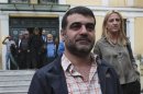 Greek editor Vaxevanis leaves a prosecutor's office in Athens