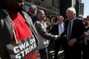 U.S. Democratic presidential candidate and U.S. Senator Bernie Sanders greets Communications Workers of America (CWA) workers striking against Verizon in Brooklyn