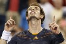Andy Murray of Britain looks up after defeating Ivan Dodig of Croatia following their match at the US Open