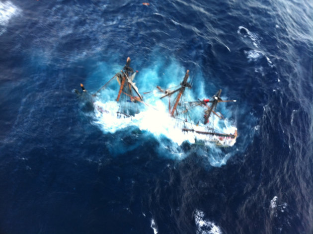 FILE - This undated file photo provided by the U.S. Coast Guard shows the HMS Bounty, a 180-foot sailboat, submerged in the Atlantic Ocean during Hurricane Sandy approximately 90 miles southeast of Hatteras, N.C., Monday, Oct. 29, 2012. Surviving crew members will testify as a federal safety panel meets Tuesday, Feb. 12, 2013 in Portsmouth, Va. to examine what led to the sinking of the replica 18th-century sailing ship during Hurricane Sandy. One member of the HMS Bounty's crew died and the captain was never found after the ship sank 90 miles off Cape Hatteras, N.C., during the October storm. (AP Photo/U.S. Coast Guard, Petty Officer 2nd Class Tim Kuklewski, File)