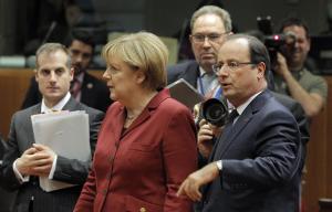 German Chancellor Angela Merkel, second left, and French …