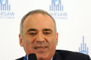 Russian chess master and political activist Garry Kasparov speaks at the Warsaw Security Forum, in Warsaw, Poland, Thursday, Nov. 20, 2014. Kasparov warned that if the west fails to stop Russia's President Vladimir Putin now, the price for doing so could get much higher. (AP Photo/Alik Keplicz)