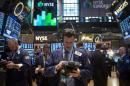 Traders work on the floor of the New York Stock Exchange