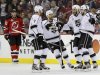 Los Angeles Kings' Drew Doughty celebrates with his teammates after scoring against the New Jersey Devils during the first period in Game 2 of the NHL Stanley Cup hockey final in Newark