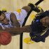 Wichita State's Carl Hall, left, and La Salle's Jerrell Wright battle under the basket during the first half of a West Regional semifinal in the NCAA college basketball tournament, Thursday, March 28, 2013, in Los Angeles. (AP Photo/Mark J. Terrill)