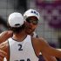 Brazil's Emanuel Rego and Alison Cerutti celebrate a point against Germany's Jonathan Erdmann and Kay Matysik during their men's round of 16 beach volleyball match at Horse Guards Parade during the London 2012 Olympic Games