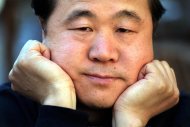 FILE -This is a May 2001 file photo of Chinese writer Mo Yan, taken in Stockholm, Sweden. Mo won the 2012 Nobel Prize for literature on Thursday Oct. 11, 2012 . (AP Photo/Scanpix Sweden /Peter Lyden, File) SWEDEN OUT