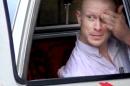 In this image taken from video obtained from Voice Of Jihad Website, which has been authenticated based on its contents and other AP reporting, Sgt. Bowe Bergdahl, sits in a vehicle guarded by the Taliban in eastern Afghanistan. A U.S. defense official says released captive Army Sgt. Bowe Bergdahl is scheduled to arrive at a military medical center in Texas on Friday. The official, who spoke Thursday on condition of anonymity because the plan has not been publicly announced, declined to provide details. Officials had previously said the intention was for Bergdahl to be reunited with his family at Brooke Army Medical Center in San Antonio. (AP Photo/Voice Of Jihad Website via AP video)