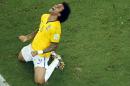 Brazil's Marcelo celebrates after the World Cup quarterfinal soccer match between Brazil and Colombia at the Arena Castelao in Fortaleza, Brazil, Friday, July 4, 2014. Brazil won 2-1. (AP Photo/Fabrizio Bensch, pool)