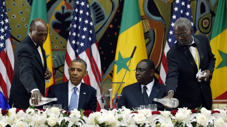 U.S. President Barack Obama participates in an official dinner with Senegal's President Macky Sall at the Presidential Palace in Dakar