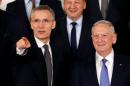 NATO Secretary-General Stoltenberg and U.S. Defense Secretary Mattis pose for a family photo during a NATO defence ministers meeting in Brussels