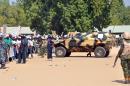 Soldiers and security block a road as they secure the venue during a rally of the ruling People's Democratic Party (PDP) in the northeast Nigerian city of Maiduguri on January 24, 2015