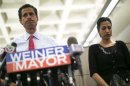 New York mayoral candidate Anthony Weiner and his wife Huma Abedin attend a news conference in New York