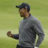 Tiger Woods of the United States reacts after a birdie on the 18th hole at Royal Lytham & St Annes golf club during the second round of the British Open Golf Championship, Lytham St Annes, England, Friday, July 20, 2012. (AP Photo/Jon Super)