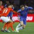 Fernando Torres of Britain's Chelsea and Hiram Mier of Mexico's Monterrey fight for the ball during their Club World Cup semi-final soccer match in Yokohama