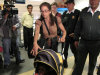 Paroled U.S. activist Lori Berenson, center, accompanied by her son Salvador Apari, walks at the international airport before boarding a flight to the  U.S. in Lima, Peru, Monday Dec. 19, 2011. Peruvian migration officials gave paroled American Lori Berenson a document Monday clearing her to leave the country with her toddler son to spend the holidays with her family in New York City.  Berenson, a former Massachusetts Institute of Technology student, was put on parole in 2010 while serving a 20-year sentence for aiding the leftist rebel Tupac Amaru Revolutionary Movement. (AP Photo/Martin Mejia)