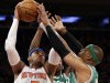 New York Knicks forward Carmelo Anthony (7) fends off Boston Celtics guard Jason Terry (8) and forward Paul Pierce, right, during the first half of Game 1 in the first round of the NBA basketball playoffs at Madison Square Garden in New York, Saturday, April 20, 2013.  (AP Photo/Kathy Willens)