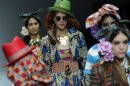 Models wear creations for Stella Jean's women's Spring-Summer 2014 collection, part of the Milan Fashion Week, unveiled in Milan, Italy, Saturday, Sept. 21, 2013. (AP Photo/Giuseppe Aresu)