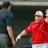 North Carolina State head coach Elliott Avent, right, argues with the umpire during the 10th inning of an NCAA college baseball tournament super regional game against Rice, Sunday, June 9, 2013, in Raleigh, N.C. (AP Photo/Karl B DeBlaker)
