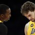 Los Angeles Lakers' Dwight Howard, left, talks to Pau Gasol, of Spain, during the first half of an NBA basketball game against the Houston Rockets in Los Angeles, Wednesday, April 17, 2013. (AP Photo/Jae C. Hong)