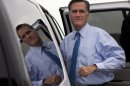 Republican presidential candidate, former Massachusetts Gov. Mitt Romney gets into his car to attend a fundraising event on Saturday, Aug. 18, 2012 in Nantucket, Mass. (AP Photo/Evan Vucci)