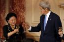 U.S. Secretary of State John Kerry toasts with Chinese Vice Premiers Liu Yandong at a joint banquet at the Strategic and Economic Dialogue (S&ED) at the State Department in Washington