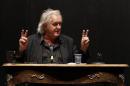 Swedish author Henning Mankell gestures during a news conference in Berlin