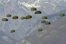 US paratroopers are dropped by a US airforce C17 (not pictured) during a training exercise over Maniago