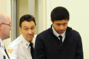 FILE - In this Dec. 4, 2013 file photo, Phillip Chism, 14, from Danvers, Mass., is lead into the court room at his arraignment in Salem Superior Court in Salem, Mass. Chism, accused of raping and killing Danvers High School teacher Colleen Ritzer in October, is returning to court Thursday, Jan. 30, 2014 for arraignment on a second rape charge. (AP Photo/The Eagle-Tribune, Paul Bilodeau, Pool, File)