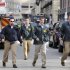 FBI agents arrive at the scene after explosions near the finish line of the Boston Marathon