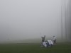 Several players warm up for the fog-delayed start to the third round of Farmers Insurance Open golf tournament, Saturday, Jan. 26, 2013, in San Diego. (AP Photo/Lenny Ignelzi)