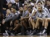 Members of the San Antonio Spurs sit on the bench during the second half of Game 2 of the NBA Finals basketball game against the Miami Heat, Sunday, June 9, 2013 in Miami.  The Miami Heat won 103-84. (AP Photo/Lynne Sladky)