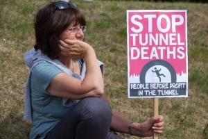 A protester pictured outside an entrance to the Eurotunnel&nbsp;&hellip;