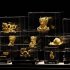 Figurines in 24K gold are displayed at a Chow Tai Fook Jewellery store in Hong Kong