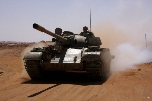 الداخلية الليبية تعلن مصادرة اكثر من مئة دبابة لدى ميليشيا موالية للقذافي Photo_1345782013148-1-0