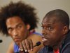 Cape Verde Islands' captain Neves looks on as team coach Antunes speaks during a news conference in Port Elizabeth