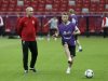 Poland's coach Smuda watches player Blaszcykowski during final practice session ahead of Euro 2012 in Warsaw