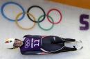 Natalie Geisenberger of Germany slides down the track during a training session for the women's singles luge at the 2014 Winter Olympics, Saturday, Feb. 8, 2014, in Krasnaya Polyana, Russia. (AP Photo/Michael Sohn)
