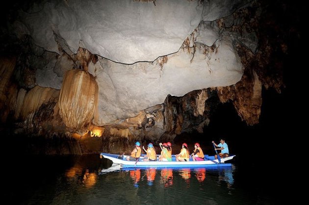 Tourists exploring a cave at the Puerto Princesa Subterrarean River National Park located in Puerto Princesa, on the western Philippine island of Palawan, on February 2011. Tourist numbers to Puerto Princesa jumped from 12,000 in 1992 to 425,000 in 2010, and many more are expected as the area gains global fame -- National Geographic named Palawan as one of its top-20 destinations this year