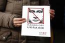 People take part in a demonstration showing support for Ukraine outside the Convention Centre where the European People's Party (EPP) Elections Congress is taking place in Dublin