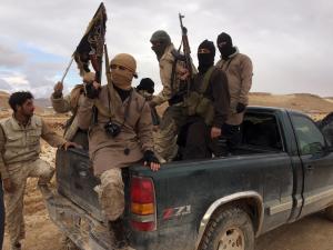 Al Qaeda-linked Nusra Front fighters carry their weapons &hellip;