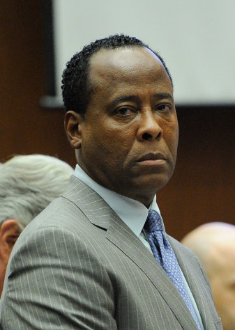 FILE - In this file photo taken Tuesday, Nov. 1, 2011 Dr. Conrad Murray waits to leave the courtroom during the final stage of his defense in his involuntary manslaughter trial in the death of singer Michael Jackson. Jail is just one of many problems looming for the Murray convicted of being responsible for Jackson?s death: lawsuits, medical licensing issues and possible payments to Jackson?s family await.(AP Photo/Kevork Djansezian, Pool, File)