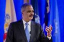 Attorney General Eric Holder speaks at the annual Attorneys General Winter Meeting in Washington, Tuesday, Feb. 25, 2014. Holder said state attorneys general are not obligated to defend laws in their states banning same sex-marriage if they don't believe in them. (AP Photo/Manuel Balce Ceneta)