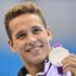 Chad Le Clos (shown with his gold medal) said he would try to make the dance