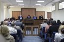 Judges attend the trial of urologist Lutfi Dervishi and his colleagues accused of organ trafficking, in Pristina